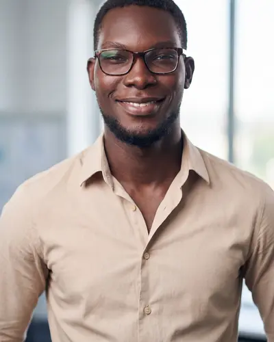 AI example made from that photo: the same man in a beige shirt in a bright office